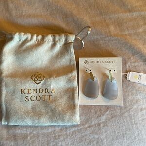 Kendra Scott earrings.